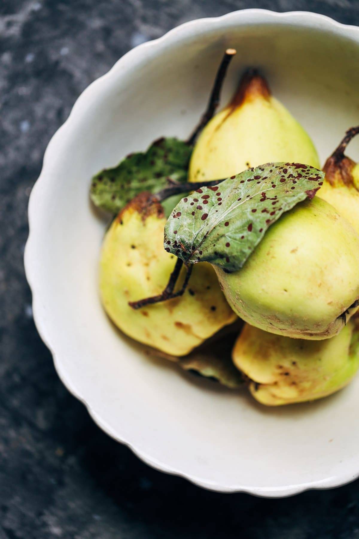 Pears in a white bowl.