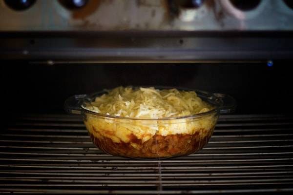 Mexican polenta pie in an oven.