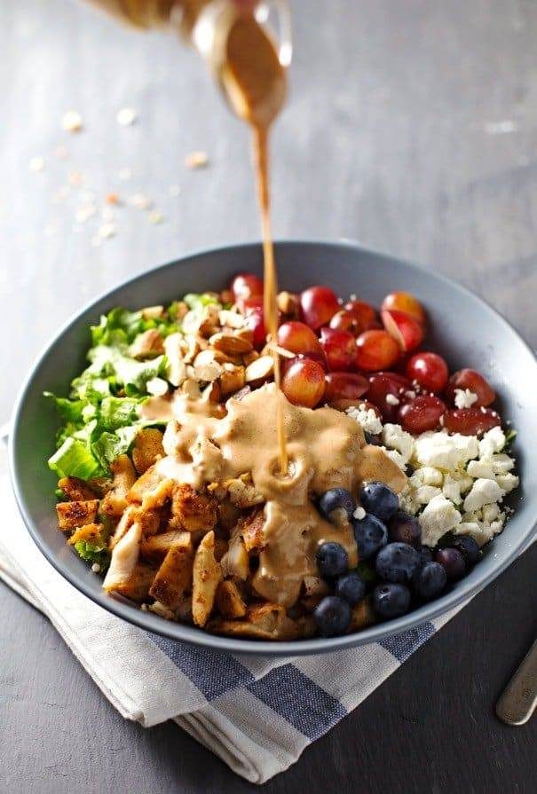 Rainbow Chicken Salad with Almond Honey Mustard Dressing in a bowl.